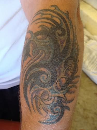 Amazing Tribal Wave Tattoo On Left Sleeve
