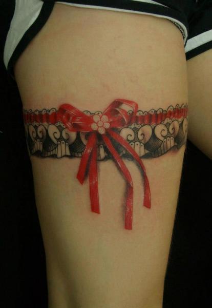 Beautiful Red Bow Garter Tattoo Image