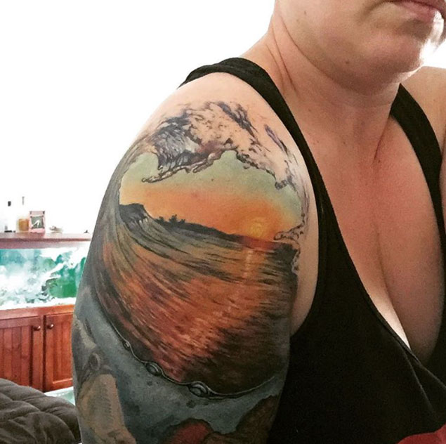 Beautiful Wave Tattoo On Girl Right Shoulder