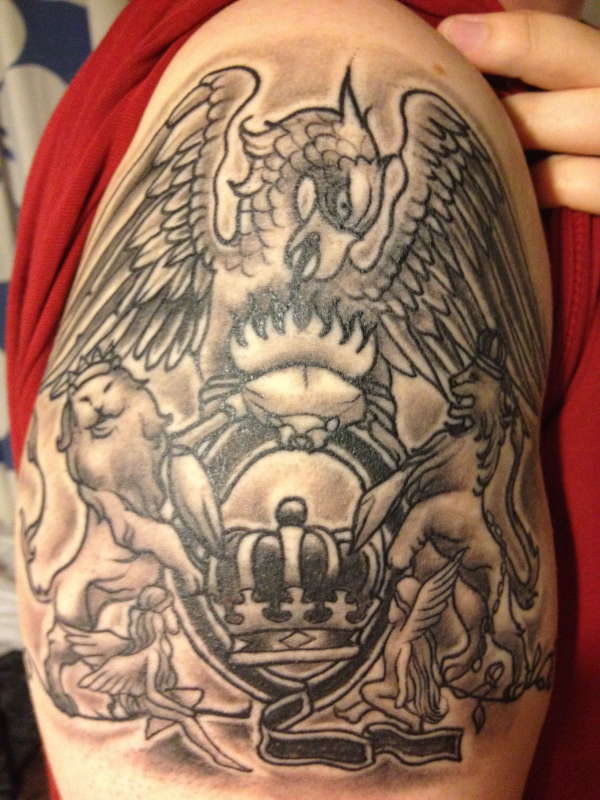 Black And Grey Queen Band Tattoo Design For Shoulder