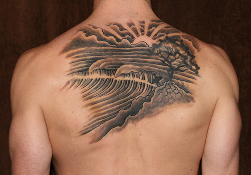 Black Grey Ink Waves On Sunset View Tattoo On Upper Back