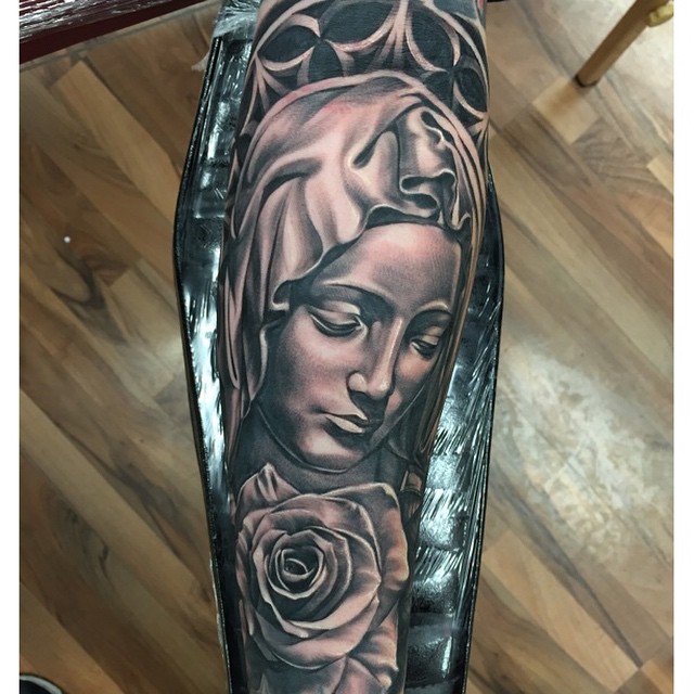 Black Ink 3D Saint Mary Mother Of God With Rose Tattoo Design For Forearm