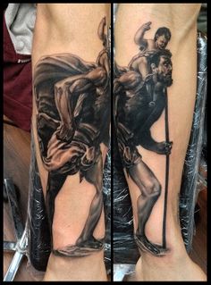 Black Ink Saint Christopher Tattoo Design For Forearm