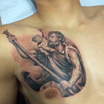 Black Ink Saint Christopher Tattoo On Man Chest