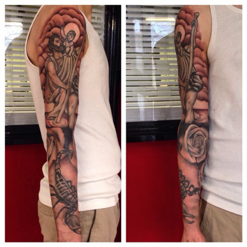 Black Ink Saint Christopher Tattoo On Man Right Full Sleeve