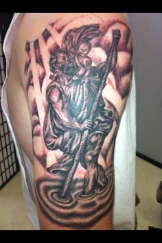 Black Ink Saint Christopher Tattoo On Right Half Sleeve By Zach Brunner