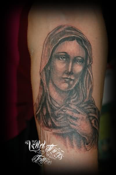 Black Ink Saint Mary Face Tattoo Design For Forearm