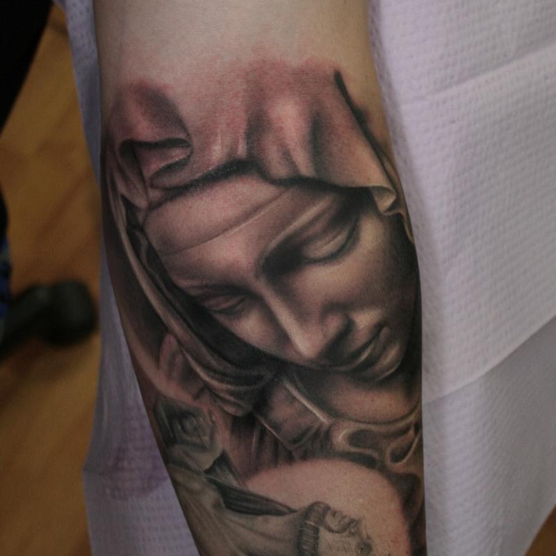 Black Ink Saint Mary Face Tattoo Design For Sleeve