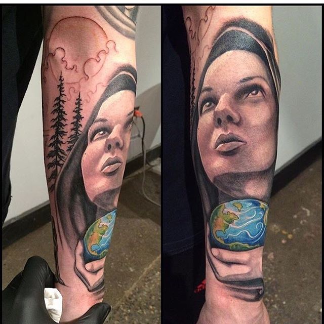 Black Ink Saint Mary Tattoo On Right Arm