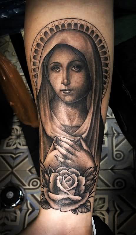 Black Ink Saint Mary With Rose Tattoo On Forearm
