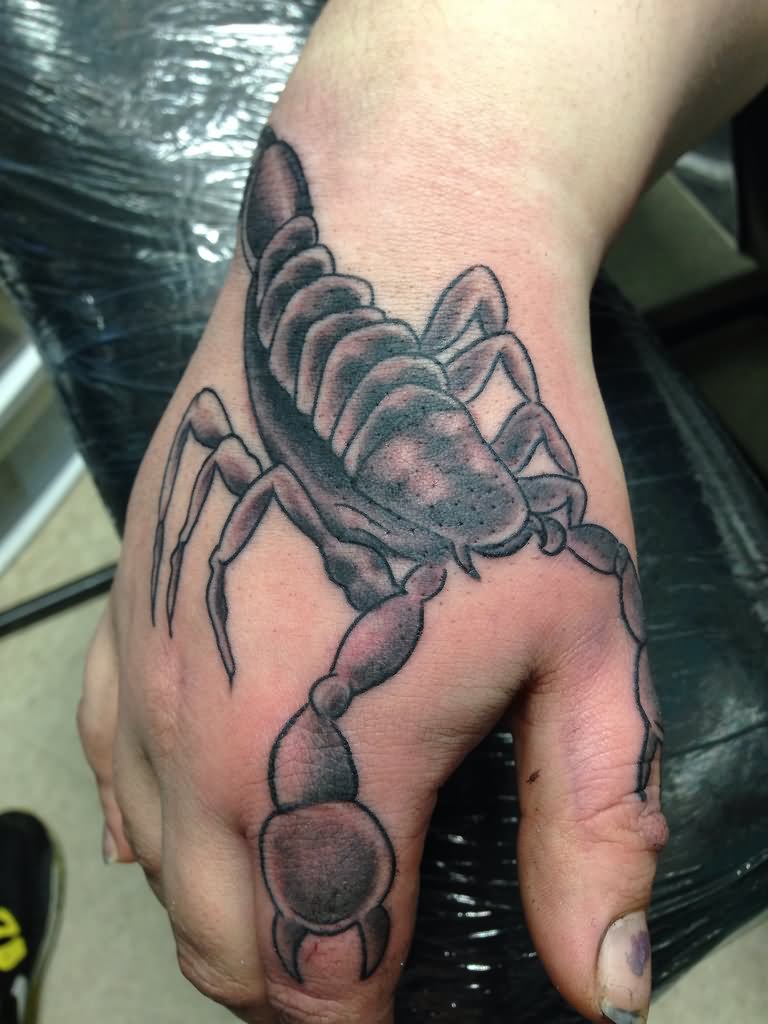 Black Ink Scorpion Tattoo On Right Hand