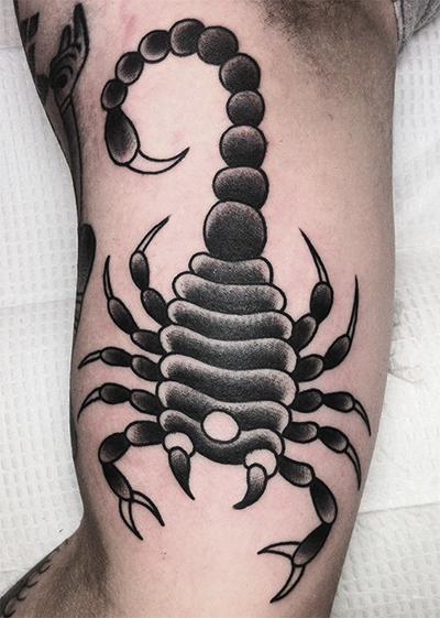 Black Ink Traditional Scorpion Tattoo On Bicep