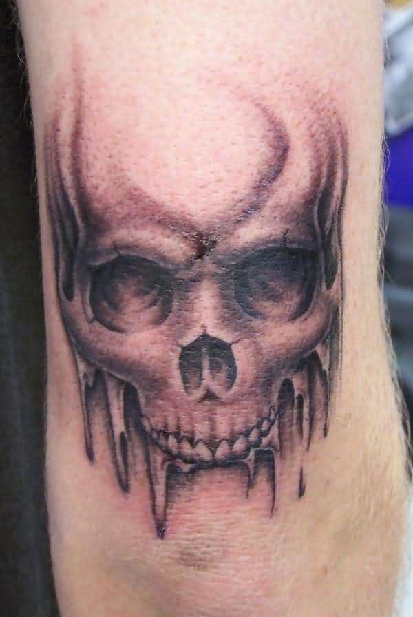 Black Ink Vampire Skull Tattoo On Sleeve