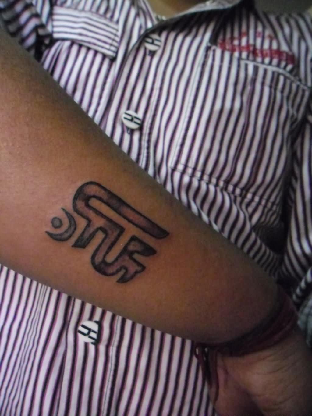 Black Jain Om Symbol Tattoo On Arm By Swapnil Jain