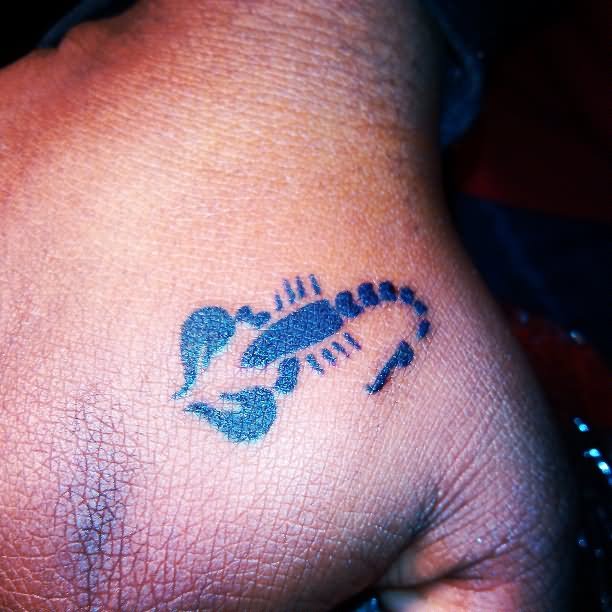 Black Little Scorpion Tattoo On Hand