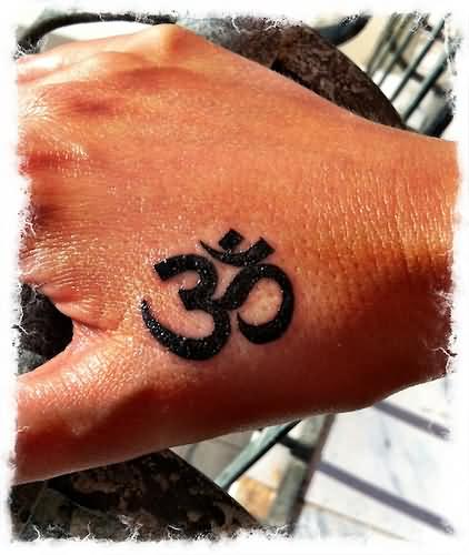 Black Om Symbol Tattoo On Hand
