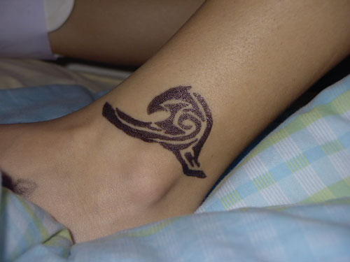Black Tribal Wave Tattoo On Leg