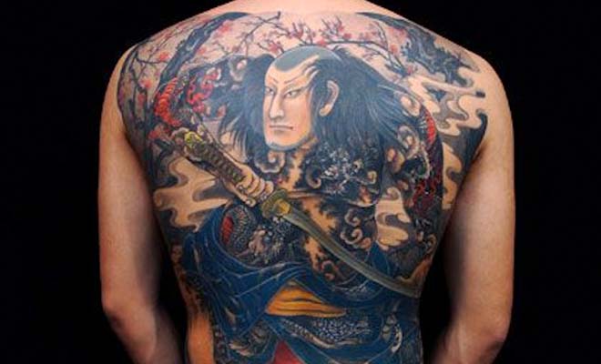 Blue Ink Samurai Tattoo On Back