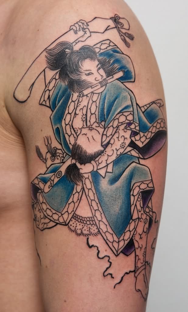 Blue Ink Samurai Tattoo On Left Shoulder