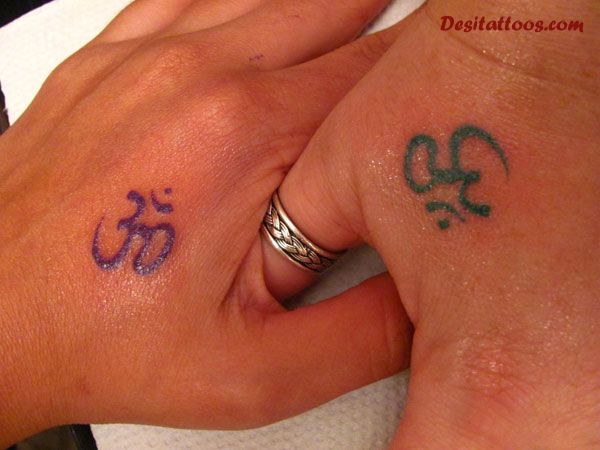 Classic Jain Om Tattoo On Couple Hand