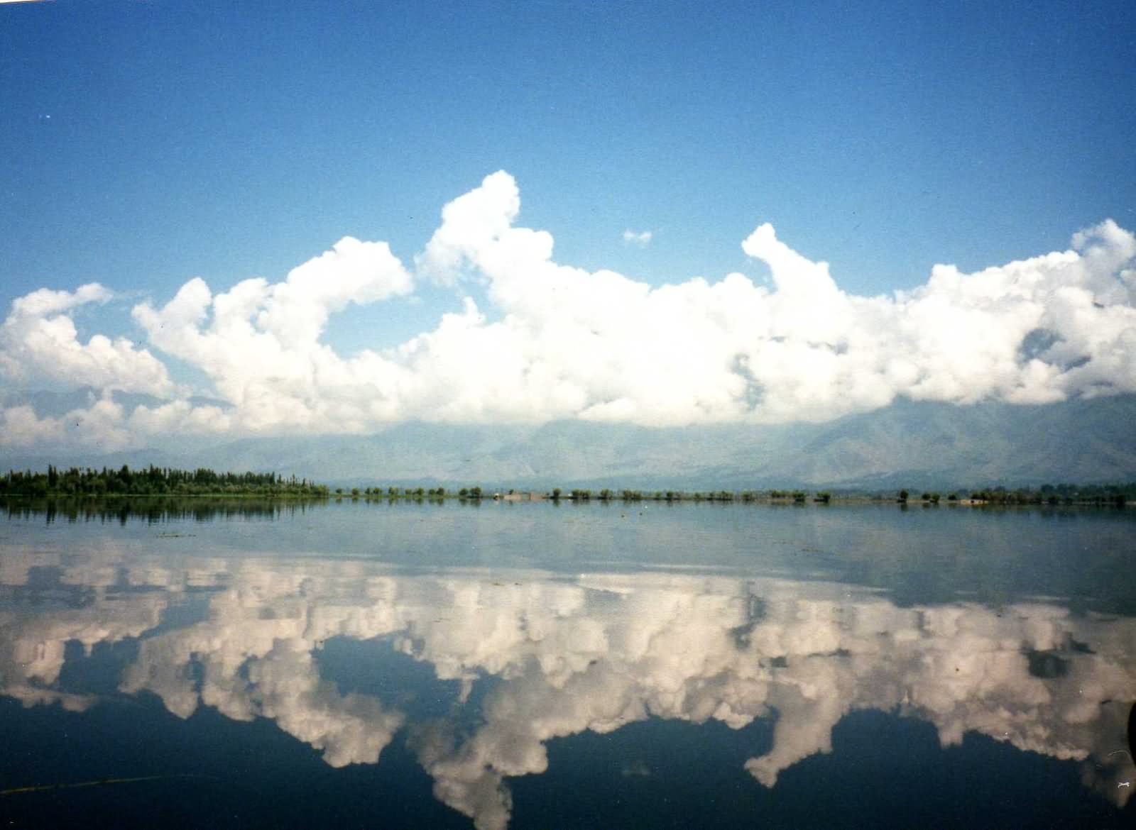 Clouds Reflection Inside The Dal Lake, Kashmir