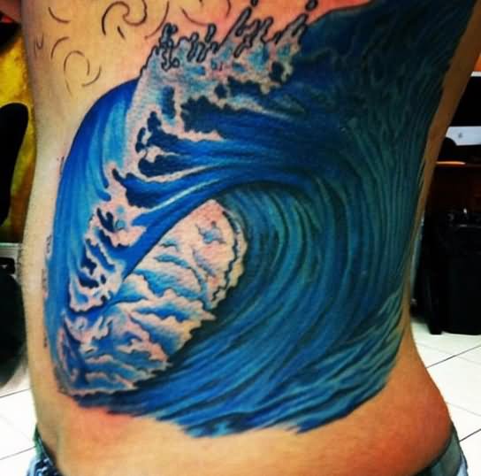 Colored Wave Tattoo On Side Rib