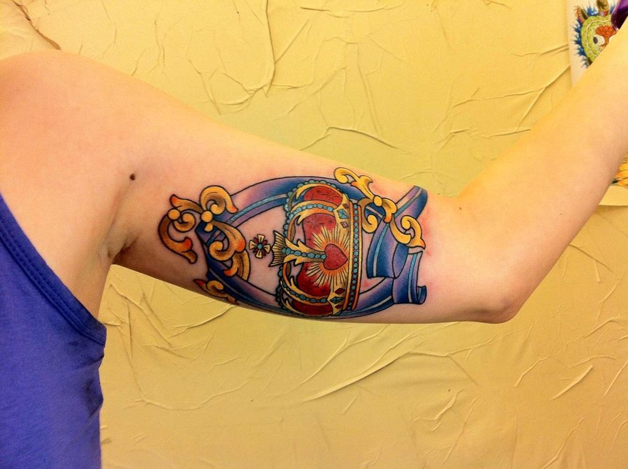 Colorful Queen Band Tattoo On Bicep By Nurru