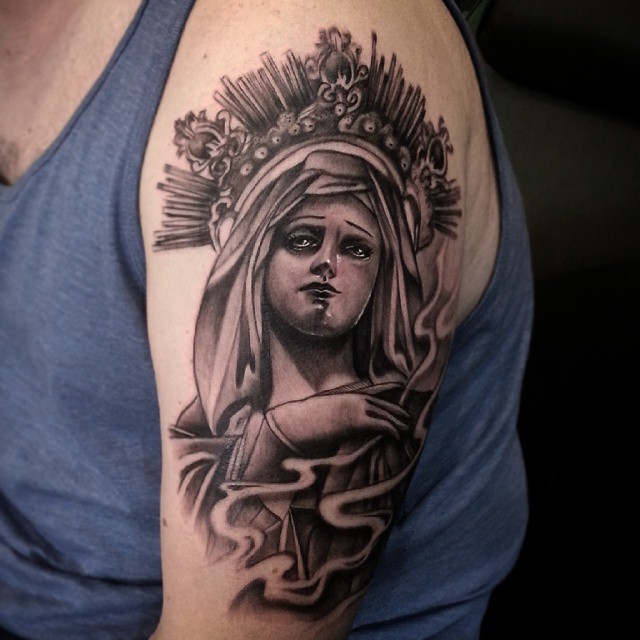 Cool Black Ink Saint Mary Mother Of God Tattoo On Left Half Sleeve
