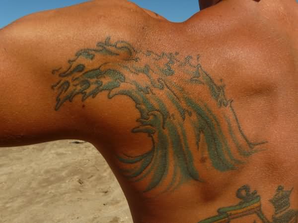 Crashing Wave Tattoo On Left Back Shoulder