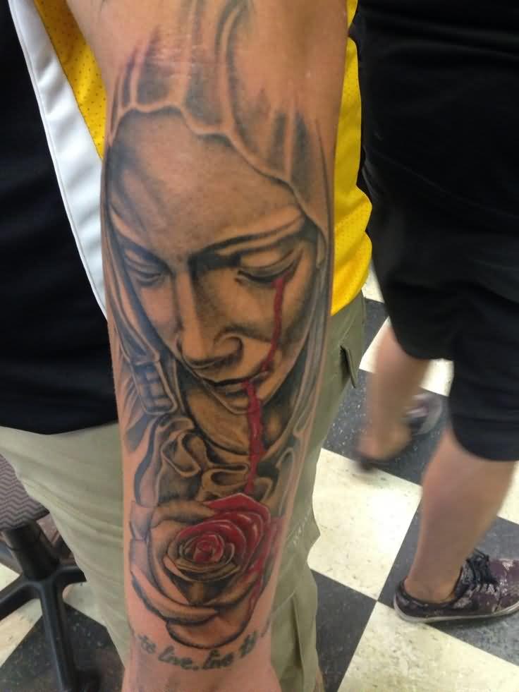 Crying Saint Mary With Rose Tattoo On Arm