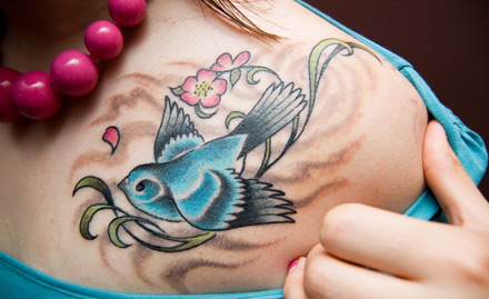 Cute Jain Bird Tattoo Design For Girl Shoulder