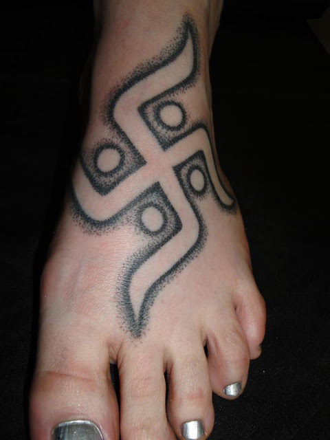 Dotwork Jain Swastik Tattoo On Girl Foot