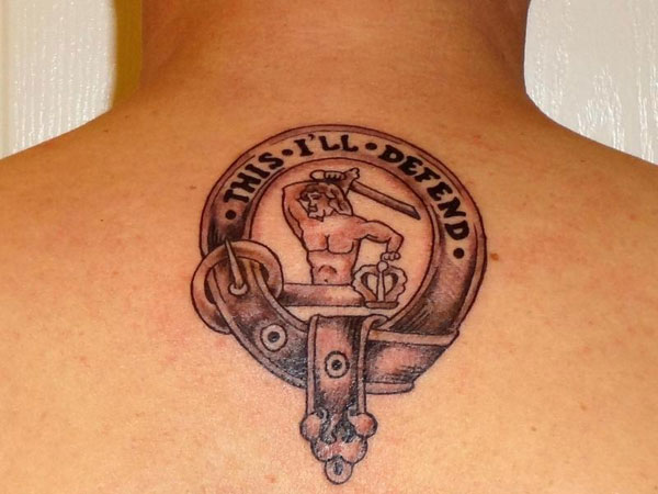 Family Pride Symbol Tattoo On Man Upper Back