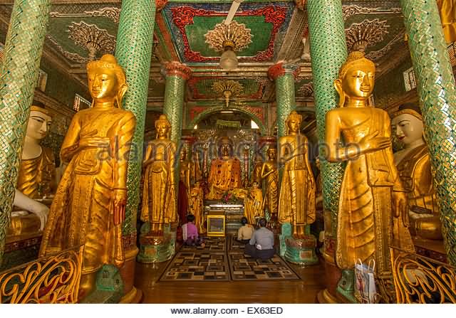 Golden Statues Inside The Shwedagon Pagoda, Yangon, Myanmar