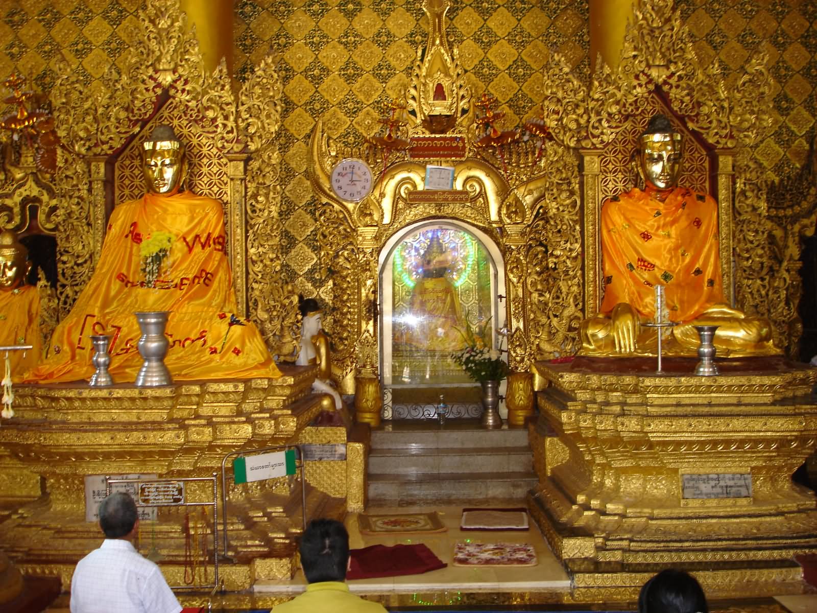 Golden Statues Of Lord Buddha Inside The Shwedagon Pagoda