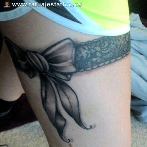 Grey And Black Ink Garter Tattoo On Thigh
