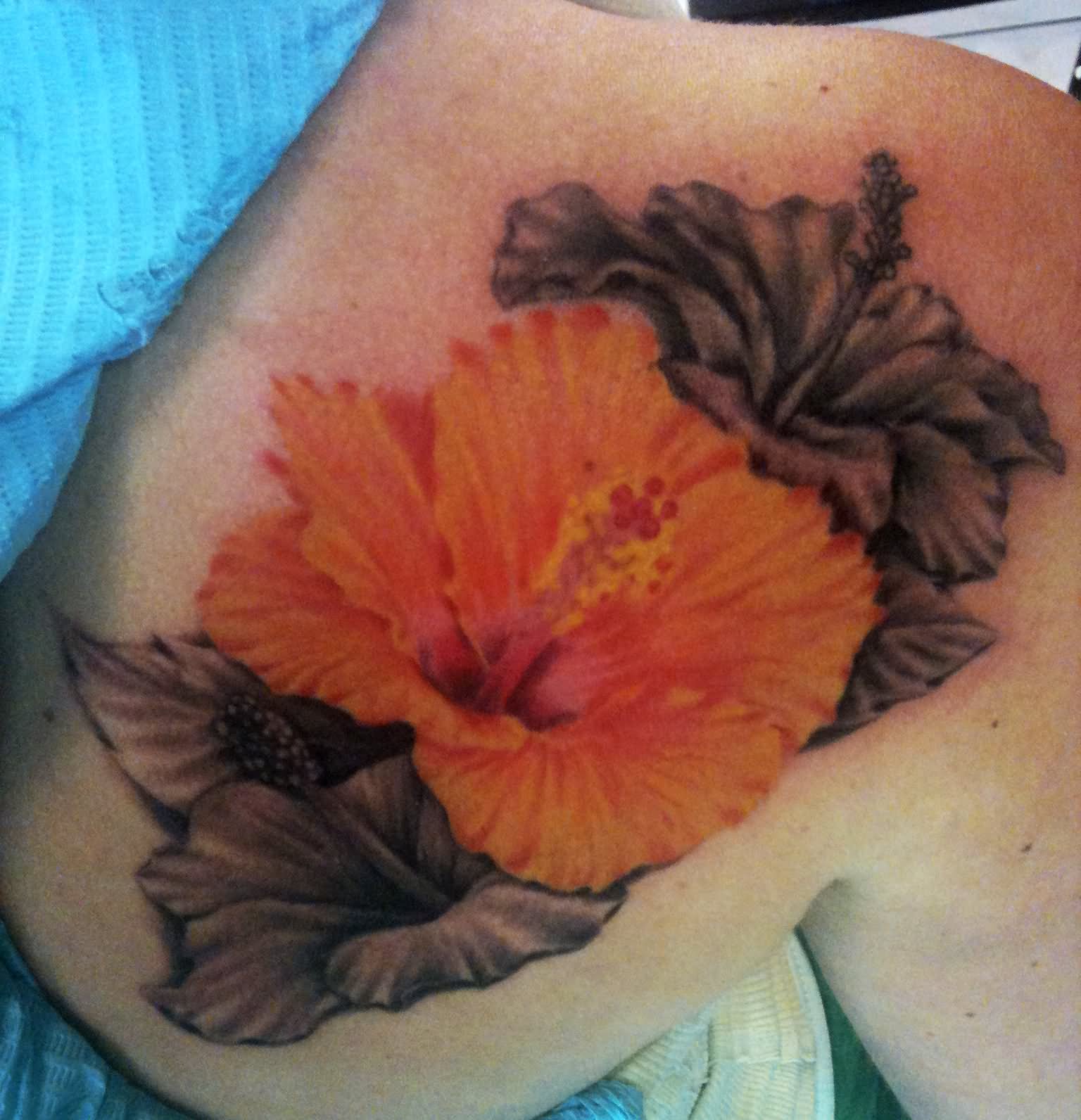 Grey And Hibiscus Tattoo On Right Back Shoulder