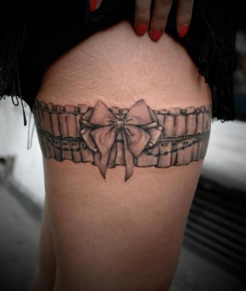 Grey Ink Garter Tattoo On Right Thigh