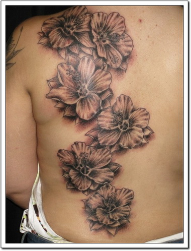 Grey Ink Hibiscus Tattoo On Left Back Shoulder