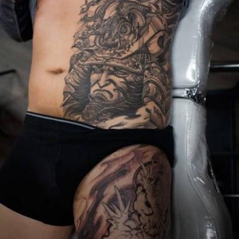 Grey Ink Samurai Tattoo On Man Side Rib