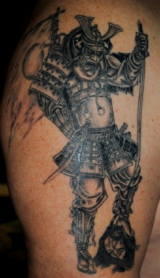 Grey Ink Samurai Tattoo On Shoulder