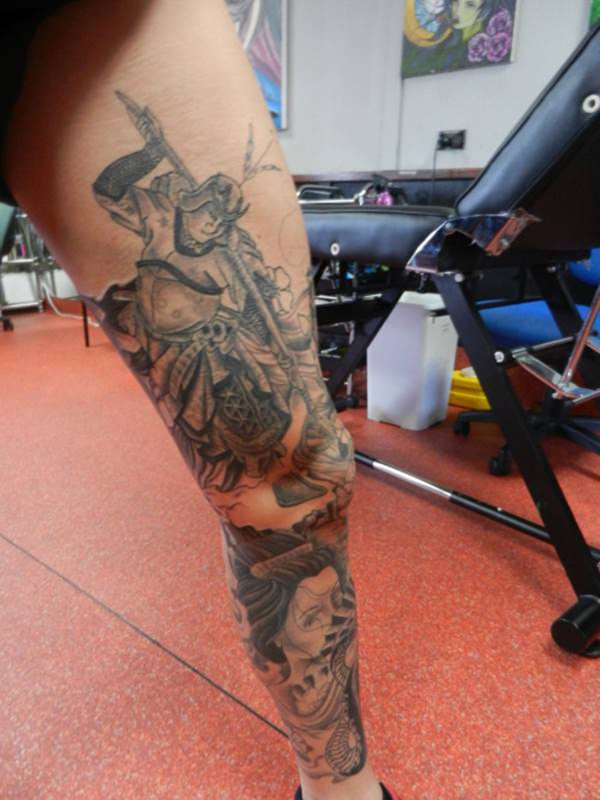 Grey Ink Samurai Warrior Tattoo On Leg
