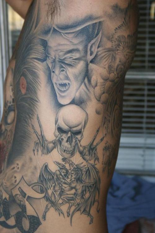 Grey Ink Vampire Skull Tattoo On Man Side Rib
