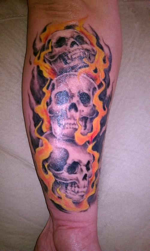 Grey Ink Vampire Skulls Tattoo On Arm