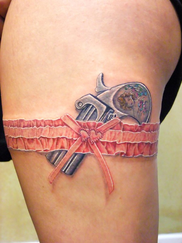 Gun Garter Tattoo On Thigh