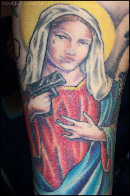 Gun In Saint Mary Hand Tattoo Design For Sleeve