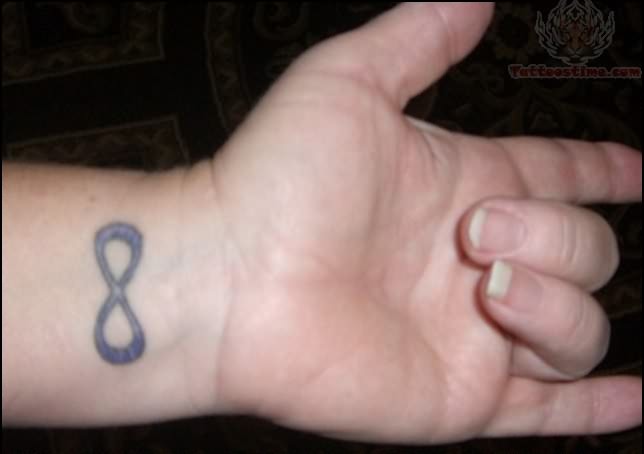 Infinity Symbol Tattoo On Man Wrist
