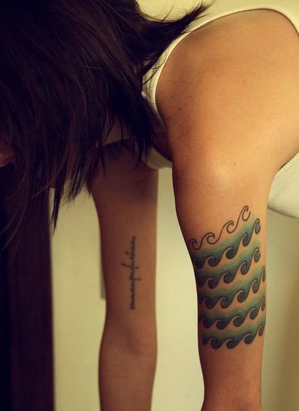 Left Bicep Wave Tattoo For Girls