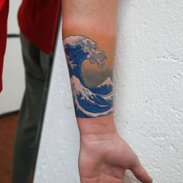 Left Forearm Colored Wave Tattoo