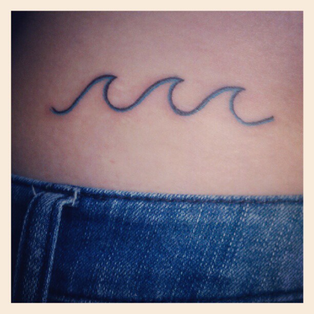 Lower Back Simple Wave Tattoo